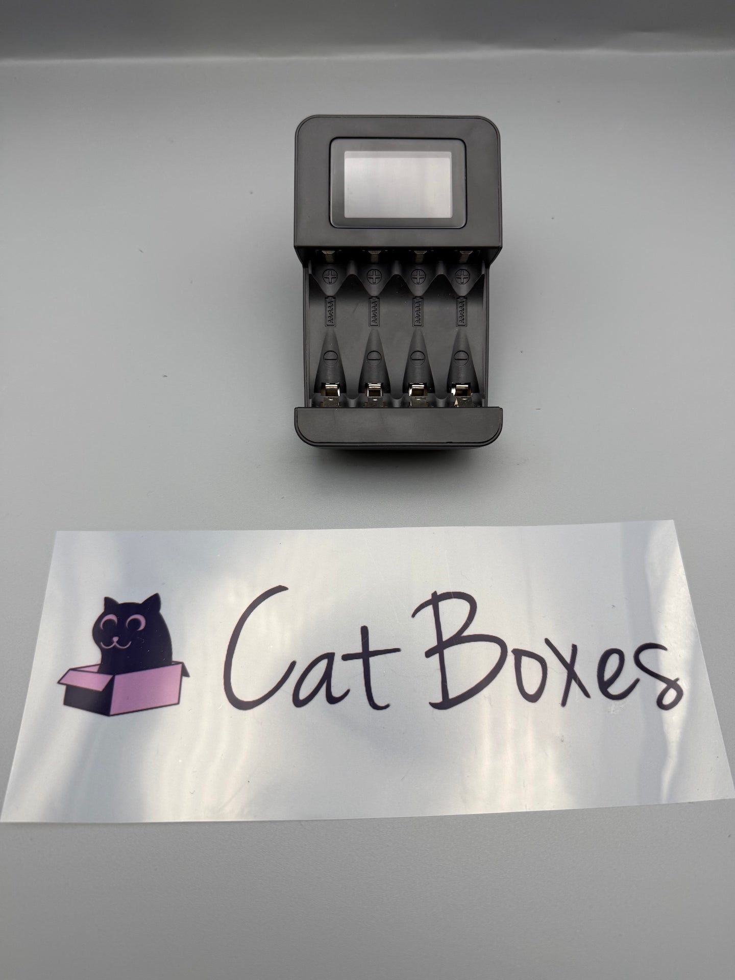 Amazon Basics Intelligent Digital Battery Charger for 4 AA, AAA, Black